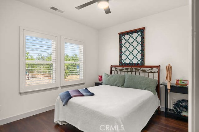 5540 Scottwood Rd, Paradise, CA 95969 - bedroom with dark wood finished floors, baseboards, and a ceiling fan