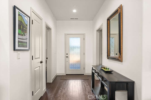 5540 Scottwood Rd, Paradise, CA 95969 - doorway with dark wood finished floors and baseboards