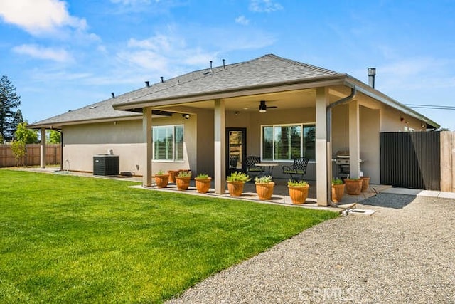 5540 Scottwood Rd, Paradise, CA 95969 - rear view of house featuring stucco siding, central AC, a ceiling fan, and a patio area