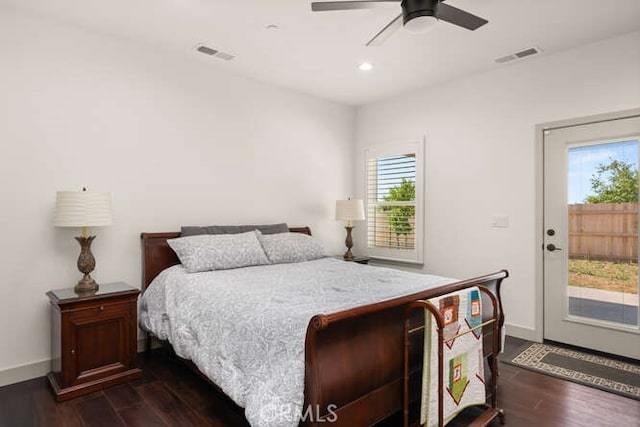5540 Scottwood Rd, Paradise, CA 95969 - bedroom with multiple windows, access to outside, dark wood-type flooring, recessed lighting, and baseboards