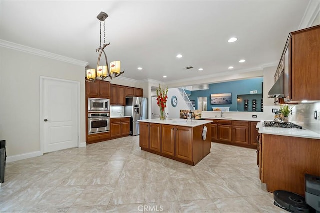 38872 Cherry Point Ln, Murrieta, CA 92563 - kitchen with appliances with stainless steel finishes, crown molding, brown cabinets, light countertops, and a chandelier