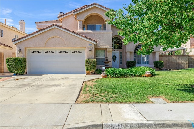 5531 Cordiva Ct, Lancaster, CA 93536 - mediterranean / spanish home featuring stucco siding, concrete driveway, an attached garage, and a tile roof