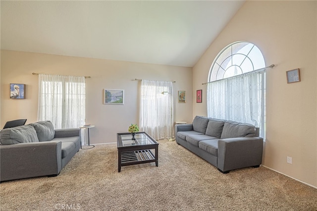 5531 Cordiva Ct, Lancaster, CA 93536 - carpeted living area with plenty of natural light, high vaulted ceiling, and baseboards