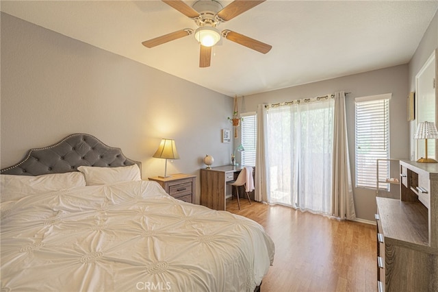 5531 Cordiva Ct, Lancaster, CA 93536 - bedroom featuring wood finished floors, a ceiling fan, and baseboards