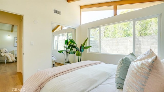 16347 Tupper St, North Hills, CA 91343 - bedroom featuring wood finished floors, a closet, and beamed ceiling