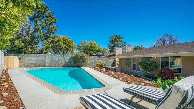 16347 Tupper St, North Hills, CA 91343 - view of pool featuring a fenced backyard and a patio