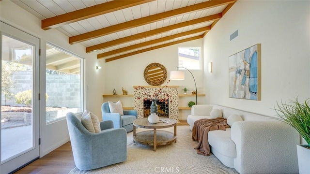 16347 Tupper St, North Hills, CA 91343 - living room with wood finished floors, wood ceiling, and a tile fireplace
