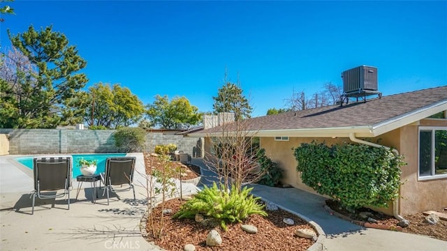 16347 Tupper St, North Hills, CA 91343 - fenced backyard featuring central air condition unit and a patio