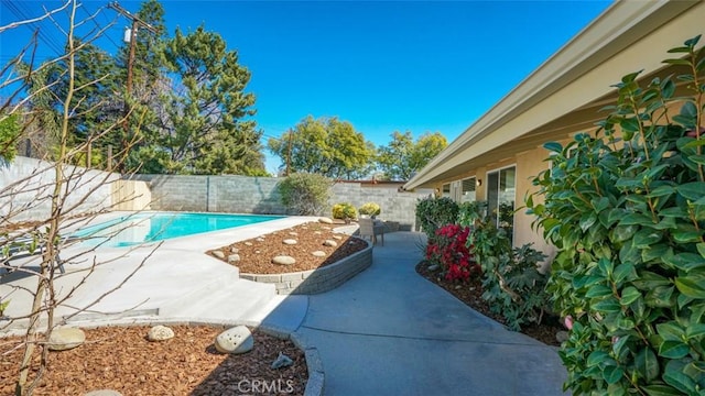16347 Tupper St, North Hills, CA 91343 - view of pool with a fenced backyard and a patio area