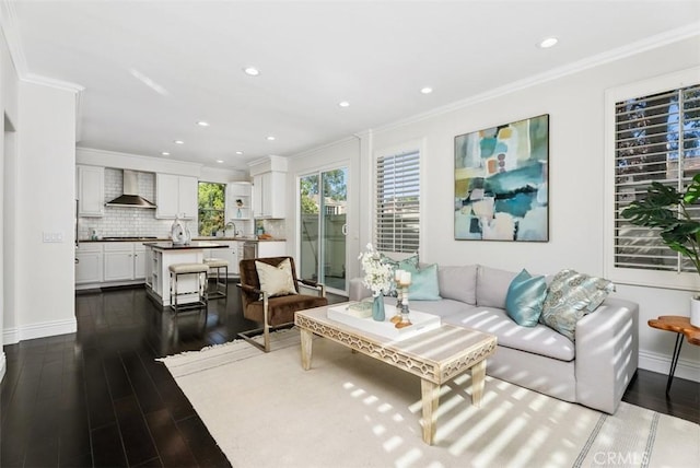 20 Fecamp, Newport Coast, CA 92657 - living area with ornamental molding, dark wood-style flooring, recessed lighting, and baseboards