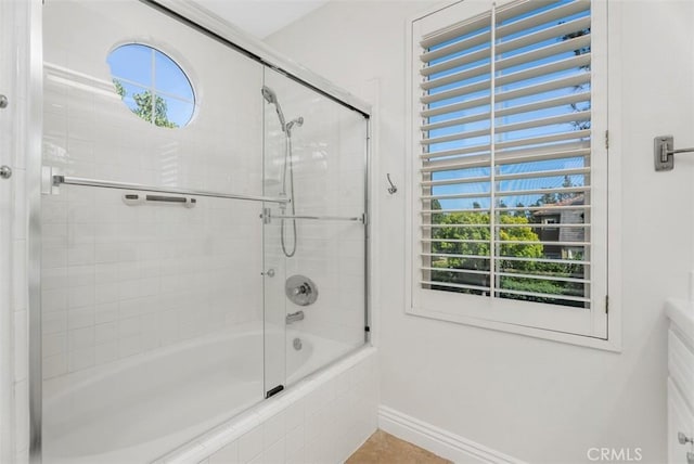 20 Fecamp, Newport Coast, CA 92657 - bathroom featuring tiled shower / bath combo and baseboards