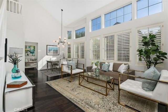 20 Fecamp, Newport Coast, CA 92657 - living area with high vaulted ceiling, dark wood-style flooring, and a chandelier