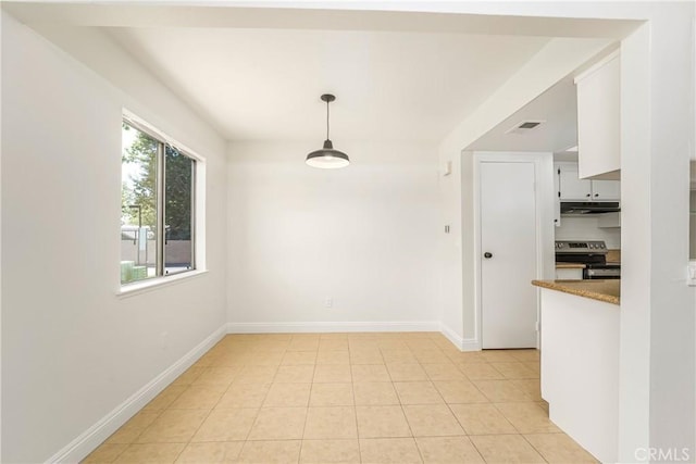26406 Paseo Pamela, San Juan Capistrano, CA 92675 - unfurnished dining area featuring baseboards and light tile patterned floors