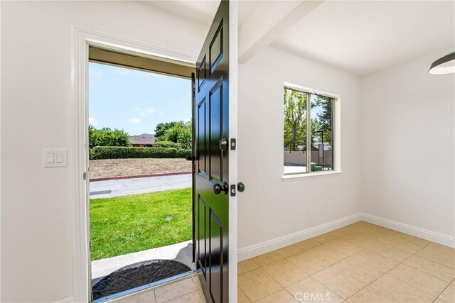 26406 Paseo Pamela, San Juan Capistrano, CA 92675 - foyer entrance featuring light tile patterned floors and baseboards