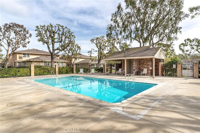 26406 Paseo Pamela, San Juan Capistrano, CA 92675 - community pool featuring a patio area and a gate
