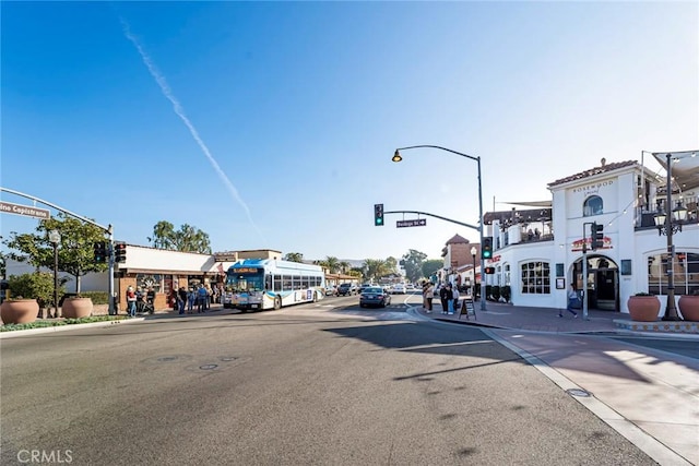 26406 Paseo Pamela, San Juan Capistrano, CA 92675 - view of asphalt road with traffic lights, sidewalks, curbs, and street lighting