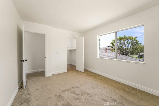 26406 Paseo Pamela, San Juan Capistrano, CA 92675 - unfurnished bedroom with carpet flooring, baseboards, a walk in closet, and a closet
