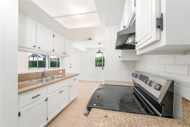 26406 Paseo Pamela, San Juan Capistrano, CA 92675 - kitchen featuring electric stove, a sink, under cabinet range hood, white cabinets, and decorative backsplash