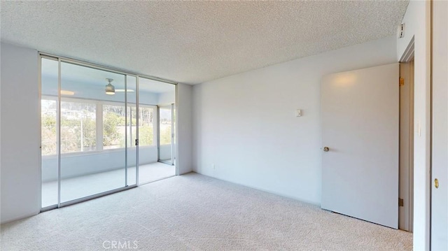 649 Paseo De La Playa Unit 303, Redondo Beach, CA 90277 - carpeted empty room featuring a textured ceiling and ceiling fan