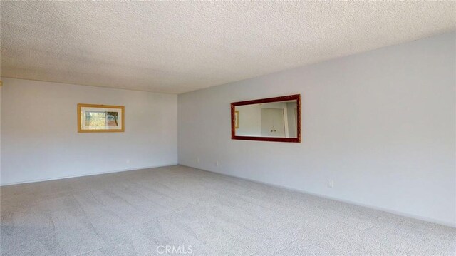 649 Paseo De La Playa Unit 303, Redondo Beach, CA 90277 - unfurnished room featuring carpet and a textured ceiling