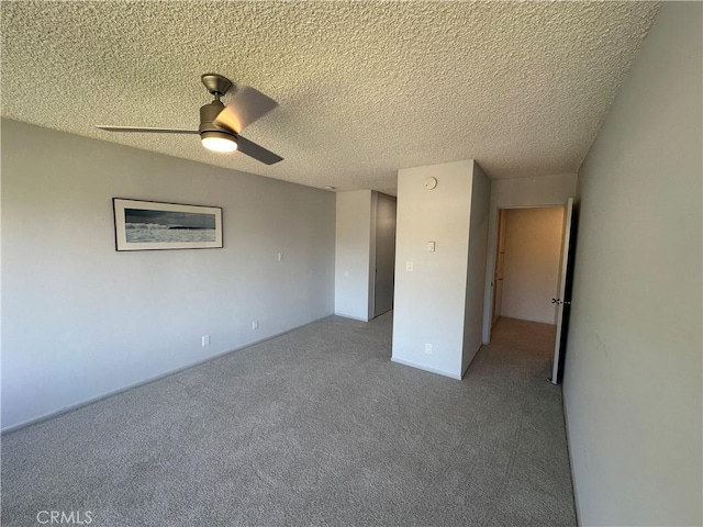 649 Paseo De La Playa Unit 303, Redondo Beach, CA 90277 - unfurnished bedroom with carpet floors, a textured ceiling, and a ceiling fan