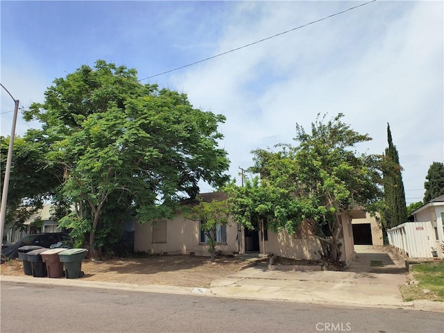 931 N Alamo St, Anaheim, CA 92801 - view of property hidden behind natural elements with stucco siding
