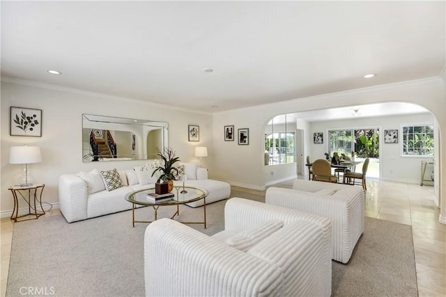 17043 Empanada Pl, Encino, CA 91436 - living area with arched walkways, crown molding, healthy amount of natural light, recessed lighting, and light tile patterned floors