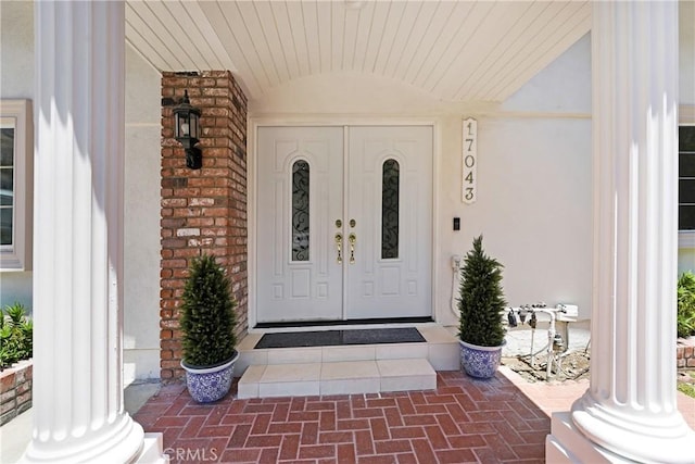 17043 Empanada Pl, Encino, CA 91436 - entrance to property with a porch, stucco siding, and brick siding