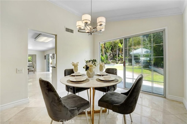 17043 Empanada Pl, Encino, CA 91436 - dining room with ornamental molding, a chandelier, and light tile patterned floors