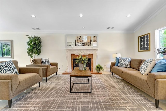 17043 Empanada Pl, Encino, CA 91436 - living room with ornamental molding, a fireplace with raised hearth, and recessed lighting