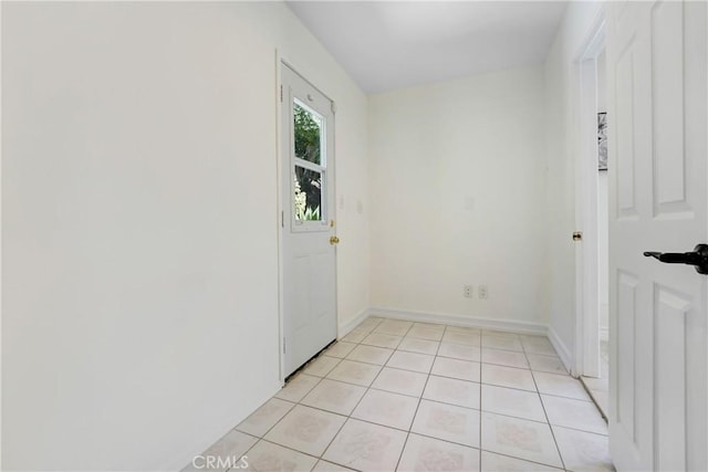 17043 Empanada Pl, Encino, CA 91436 - unfurnished room featuring light tile patterned flooring and baseboards