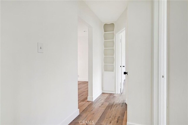 4427 Exposition Blvd, Los Angeles, CA 90016 - corridor with light wood-style floors and baseboards