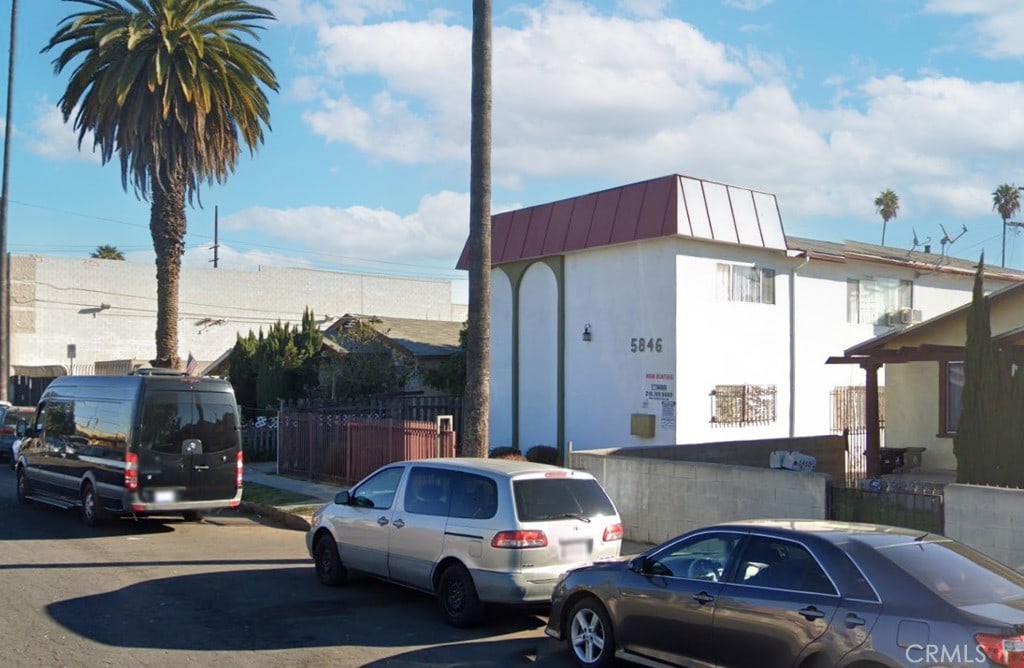 5846 Estrella Ave, Los Angeles, CA 90044 - view of side of property with a standing seam roof and metal roof