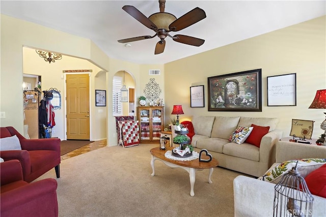 841 Bermuda Dr, Hemet, CA 92543 - carpeted living room with arched walkways and ceiling fan