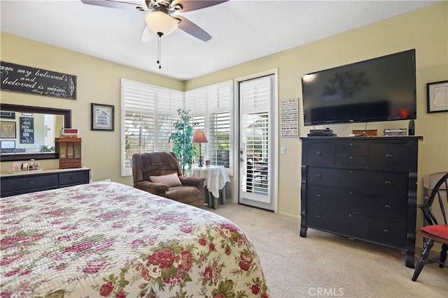 841 Bermuda Dr, Hemet, CA 92543 - bedroom with light colored carpet, access to outside, and a ceiling fan