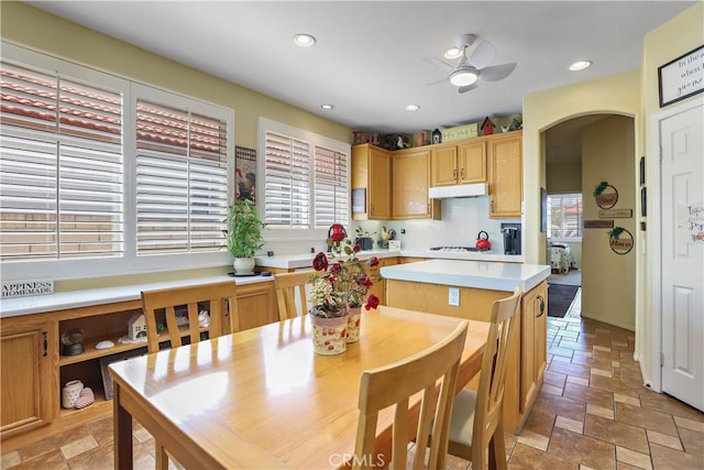 841 Bermuda Dr, Hemet, CA 92543 - kitchen featuring under cabinet range hood, a ceiling fan, stone tile flooring, light countertops, and recessed lighting