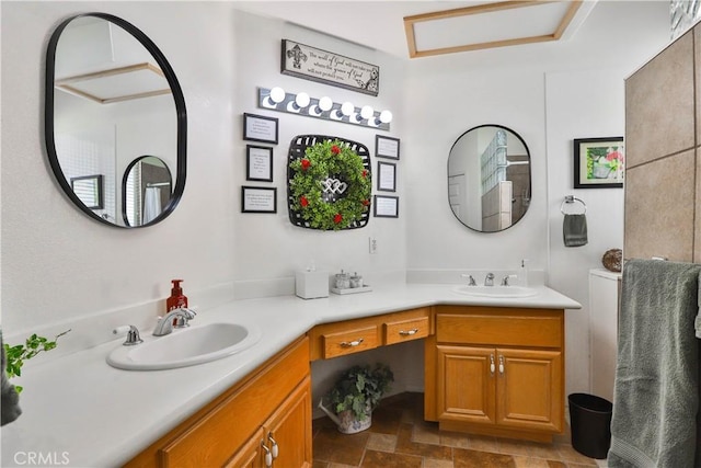 841 Bermuda Dr, Hemet, CA 92543 - bathroom featuring double vanity and stone finish floors