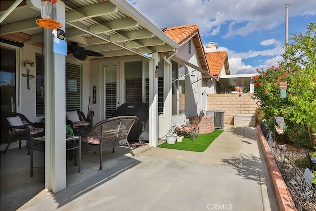 841 Bermuda Dr, Hemet, CA 92543 - view of patio featuring ceiling fan, cooling unit, and area for grilling