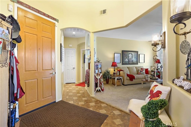 841 Bermuda Dr, Hemet, CA 92543 - foyer with arched walkways and stone finish flooring