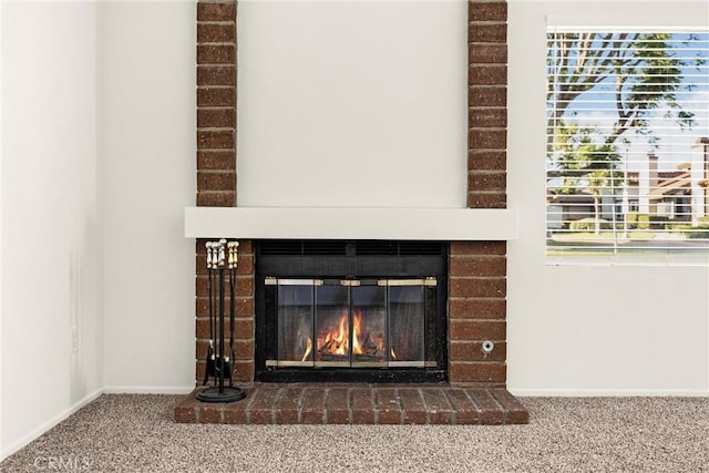 625 E Merion St, Ontario, CA 91761 - detailed view of carpet, a brick fireplace, and baseboards
