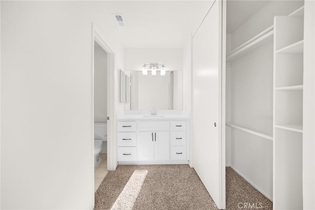 625 E Merion St, Ontario, CA 91761 - bathroom with vanity, toilet, and a spacious closet