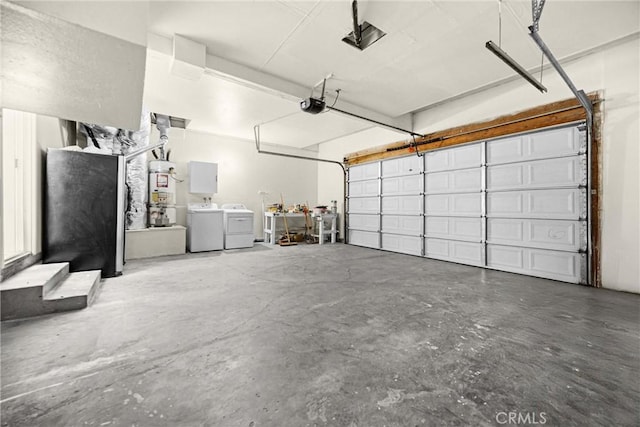 625 E Merion St, Ontario, CA 91761 - garage featuring strapped water heater, a garage door opener, and separate washer and dryer