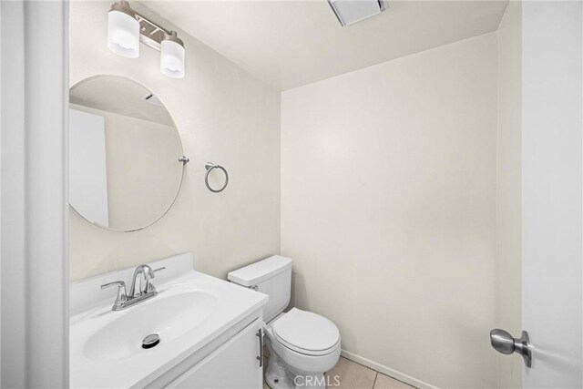 625 E Merion St, Ontario, CA 91761 - half bath featuring toilet, tile patterned flooring, and vanity