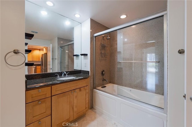 3061 W 12th Pl Unit 101, Los Angeles, CA 90006 - full bath featuring vanity, bath / shower combo with glass door, recessed lighting, and tile patterned floors