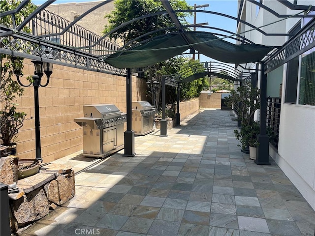 3061 W 12th Pl Unit 101, Los Angeles, CA 90006 - view of patio / terrace featuring grilling area