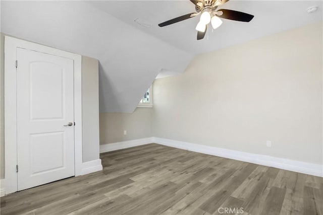 1835 Martin Luther King Blvd, Riverside, CA 92507 - bonus room featuring wood finished floors, baseboards, lofted ceiling, and ceiling fan