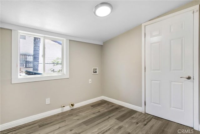 1835 Martin Luther King Blvd, Riverside, CA 92507 - washroom featuring hookup for a washing machine, wood finished floors, and baseboards