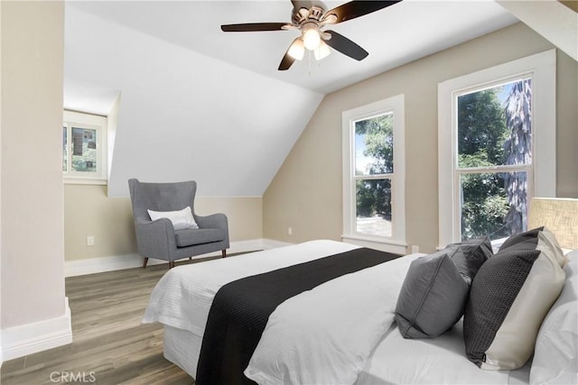1835 Martin Luther King Blvd, Riverside, CA 92507 - bedroom featuring wood finished floors, baseboards, vaulted ceiling, and a ceiling fan