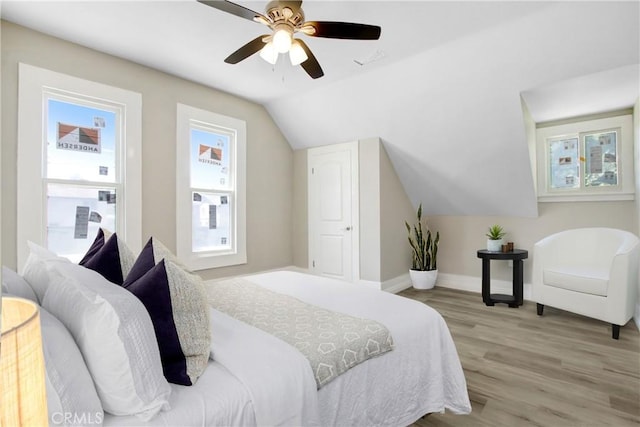 1835 Martin Luther King Blvd, Riverside, CA 92507 - bedroom with light wood-type flooring, lofted ceiling, baseboards, and ceiling fan