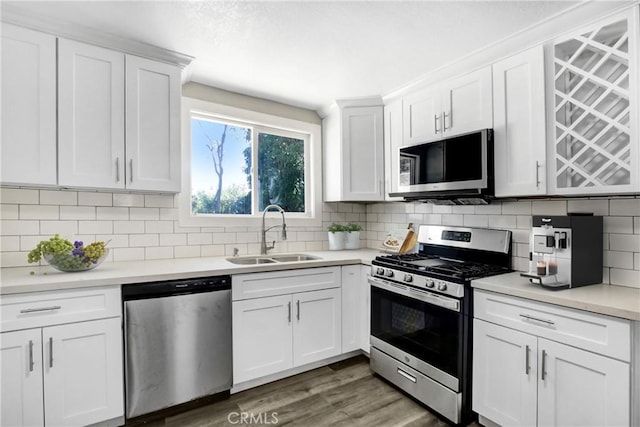 1835 Martin Luther King Blvd, Riverside, CA 92507 - kitchen featuring stainless steel appliances, a sink, and white cabinetry